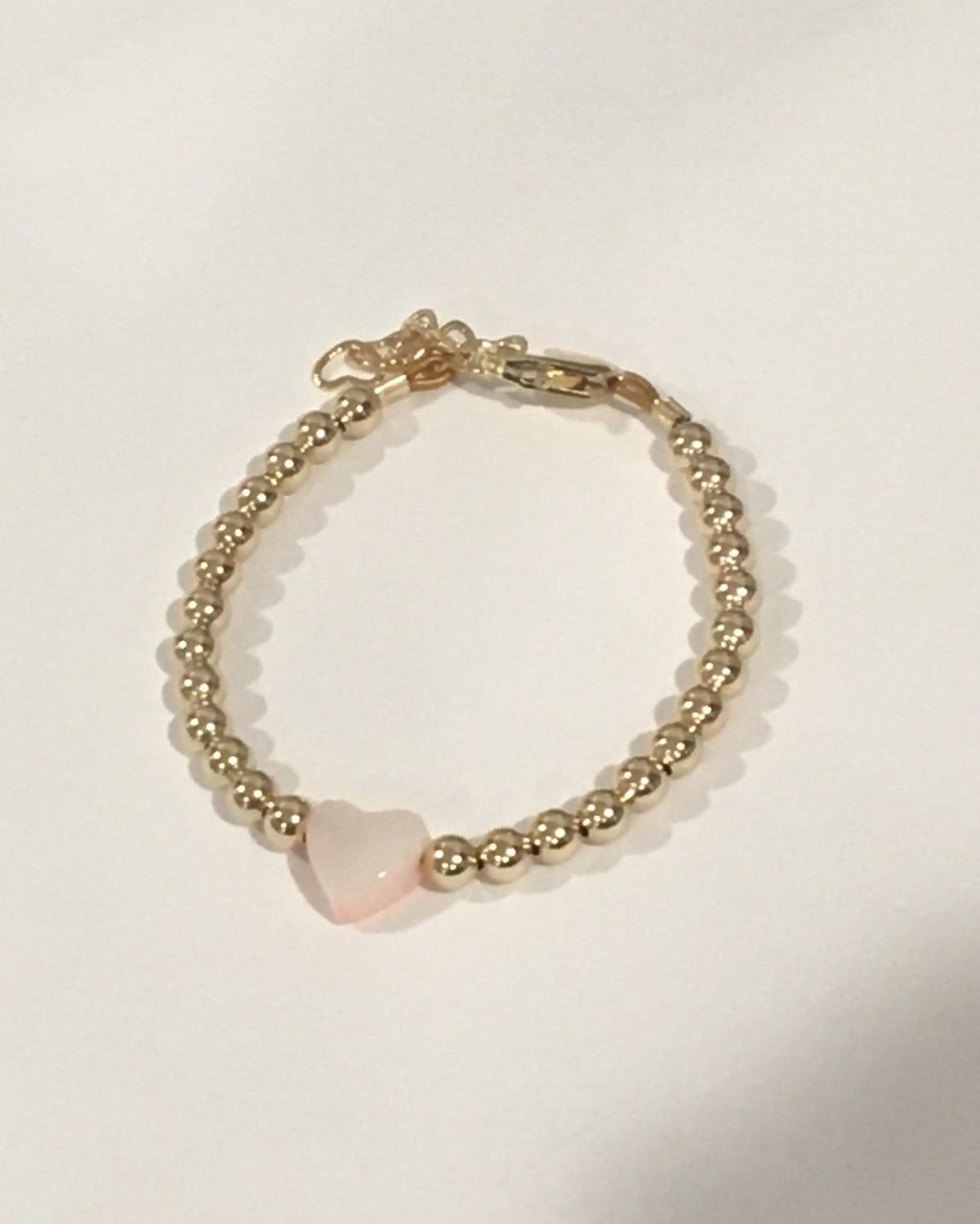 Circlets Gold Strand With Pink Heart Bracelet